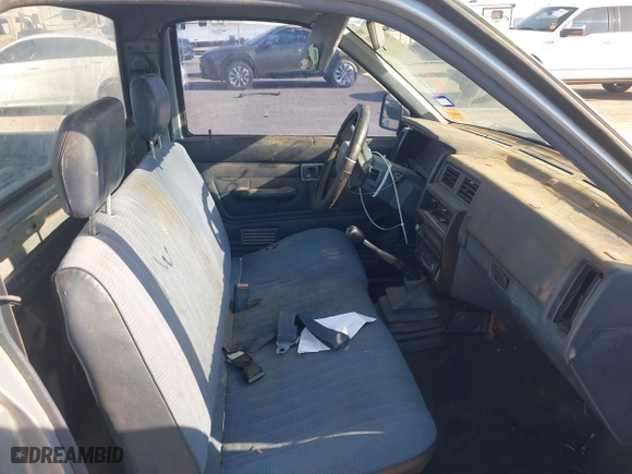 1990 Nissan Trucks 2WD XE with VIN 1N6SD11S4LC400985, listed as a IAAI auction lot 41986390 with 189,924 mi miles. Bid and sale history available at carsss.com. Image 5.