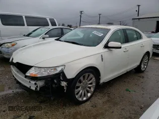 2012 Lincoln MKS with VIN 1LNHL9DR6CG804706, listed as a Copart auction lot 82585533 with 87,563 mi miles and Salvage Title. Bid and sale history available at carsss.com. Image 1.
