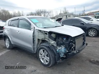 2018 Kia Sportage LX with VIN KNDPMCAC4J7437926, listed as a IAAI auction lot 41968696 with 139,304 mi miles. Bid and sale history available at carsss.com. Image 1.