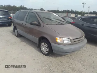 1999 Toyota Sienna LE z VIN 4T3ZF13C6XU098149, wystawiony jako IAAI lot #42101677 z przebiegiem 193 175 mil mil oraz . Historia ofert i sprzedaży dostępna na DreamBid. Obrazek 1.
