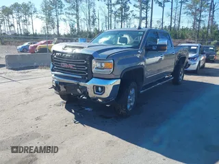 2017 GMC Sierra 2500HD SLT with VIN 1GT12TEY1HF165837, listed as a IAAI auction lot 41230286 with 167,824 mi miles. Bid and sale history available at carsss.com. Image 2.
