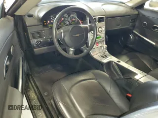 2004 Chrysler Crossfire z VIN 1C3AN69L14X000452, wystawiony jako Copart lot #73599474 z przebiegiem 69 716 mil mil oraz Szkoda całkowita • Salvage title. Historia ofert i sprzedaży dostępna na DreamBid. Obrazek 8.