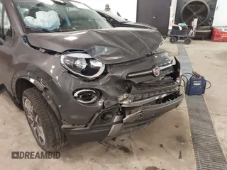 2021 FIAT 500X Trekking with VIN ZFBNF3B17MP909591, listed as a IAAI auction lot 41256551 with 58,688 mi miles and . Bid and sale history available at DreamBid. Image 6.