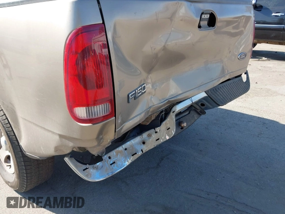 2002 Ford F-150 XL with VIN 1FTRX17WX2NA97846, listed as a IAAI auction lot 42682857 with 185,438 mi miles and . Bid and sale history available at DreamBid. Image 6.