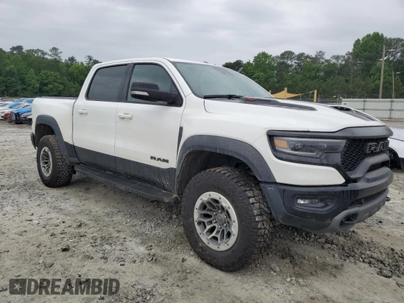 2021 Ram 1500 TRX with VIN 1C6SRFU97MN745516, listed as a Copart auction lot 49011924 with 0 mi miles and Salvage Title. Bid and sale history available at carsss.com. Image 4.