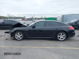 2015 Porsche Panamera 4 с VIN WP0AA2A70FL002802, выставлен на аукционе IAAI как лот 41303802 с пробегом 58 496 миль миль и . История ставок и продаж доступна на DreamBid. Изображение 14.