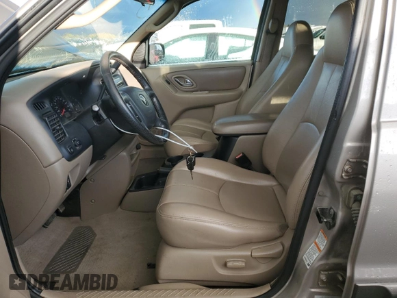 2001 Mazda Tribute LX with VIN 4F2CU08141KM64641, listed as a Copart auction lot 78269324 with 175,438 mi miles and Salvage Title. Bid and sale history available at DreamBid. Image 7.