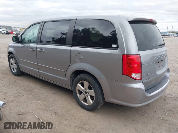 2014 Dodge Grand Caravan American Value with VIN 2C4RDGBG0ER168085, listed as a IAAI auction lot 42020959 with 213,383 mi miles and . Bid and sale history available at DreamBid. Image 3.