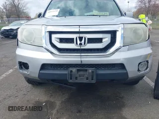 2011 Honda Pilot EX-L with VIN 5FNYF4H68BB017361, listed as a IAAI auction lot 41933024 with 338,819 mi miles and . Bid and sale history available at carsss.com. Image 4.