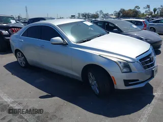2016 Cadillac ATS Standard RWD with VIN 1G6AA5RAXG0113610, listed as a IAAI auction lot 42002672 with 90,145 mi miles and . Bid and sale history available at DreamBid. Image 1.
