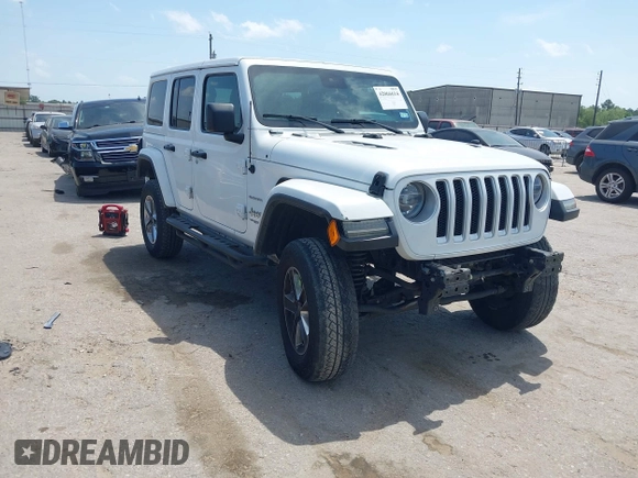 2018 Jeep Wrangler Unlimited Sahara z VIN 1C4HJXEG0JW245118, wystawiony jako IAAI lot #42066614 z przebiegiem 83 743 mil mil oraz . Historia ofert i sprzedaży dostępna na DreamBid. Obrazek 1.