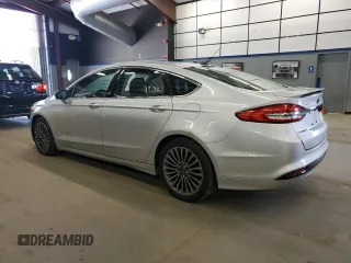 2017 Ford Fusion Hybrid Titanium z VIN 3FA6P0RU1HR300370, wystawiony jako Copart lot #65206605 z przebiegiem 150 424 mil mil oraz Czysty tytuł • Clean title. Historia ofert i sprzedaży dostępna na DreamBid. Obrazek 2.