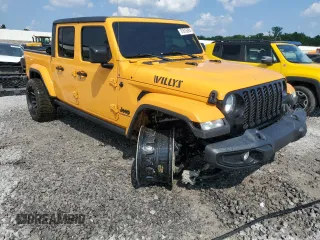 2021 Jeep Gladiator Sport S с VIN 1C6HJTAG9ML561192, выставлен на аукционе Copart как лот 61616395 с пробегом 76 399 миль миль и Списание • Salvage title. История ставок и продаж доступна на DreamBid. Изображение 4.