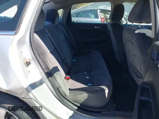 2014 Chevrolet Impala LS with VIN 2G1WA5E39E1153813, listed as a IAAI auction lot 42062409 with 343,418 mi miles and . Bid and sale history available at DreamBid. Image 8.