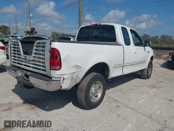 1997 Ford F-150 XL with VIN 1FTDX1868VKA12923, listed as a IAAI auction lot 41526986 with 343,755 mi miles. Bid and sale history available at carsss.com. Image 4.