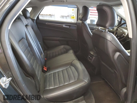 2015 Ford Fusion SE z VIN 3FA6P0H98FR295646, wystawiony jako Copart lot #57055105 z przebiegiem 121 515 mil mil oraz Szkoda całkowita • Salvage title. Historia ofert i sprzedaży dostępna na DreamBid. Obrazek 10.