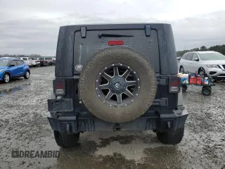 2009 Jeep Wrangler X with VIN 1J4FA241X9L735743, listed as a Copart auction lot 48109455 with 232,110 mi miles and Salvage Title. Bid and sale history available at DreamBid. Image 6.