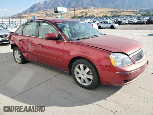 2005 Ford Five Hundred SE with VIN 1FAFP23115G159622, listed as a Copart auction lot 70700344 with 159,788 mi miles and Salvage Title. Bid and sale history available at carsss.com. Image 4.