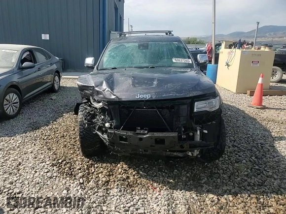 2014 Jeep Grand Cherokee Summit with VIN 1C4RJFJM8EC395169, listed as a Copart auction lot 60637265 with 116,575 mi miles and Salvage title. Bid and sale history available at DreamBid. Image 13.