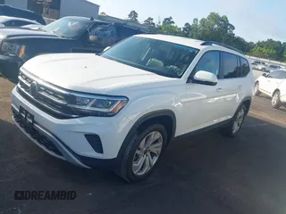 2021 Volkswagen Atlas SE with VIN 1V2HR2CA8MC575779, listed as a IAAI auction lot 42542070 with 84,849 mi miles and . Bid and sale history available at DreamBid. Image 16.
