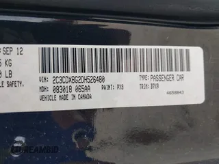 2013 Dodge Charger SE with VIN 2C3CDXBG2DH526480, listed as a IAAI auction lot 42025293 with 147,385 mi miles. Bid and sale history available at carsss.com. Image 9.