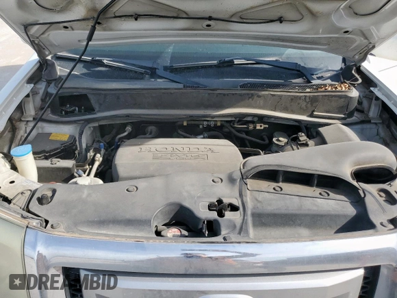 2011 Honda Pilot Touring z VIN 5FNYF3H98BB005411, wystawiony jako Copart lot #52392765 z przebiegiem 155 541 mil mil oraz Szkoda całkowita • Salvage title. Historia ofert i sprzedaży dostępna na DreamBid. Obrazek 12.