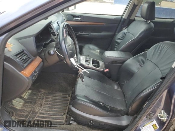 2014 Subaru Outback Limited with VIN 4S4BRBNCXE3300983, listed as a Copart auction lot 63512875 with 183,183 mi miles and Salvage title. Bid and sale history available at DreamBid. Image 7.