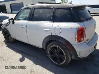 2013 MINI Countryman S with VIN WMWZC3C5XDWP22342, listed as a Copart auction lot 49702823 with 104,441 mi miles and Non repairable. Bid and sale history available at DreamBid. Image 2.