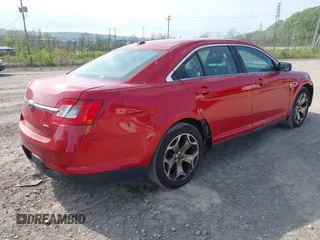 2011 Ford Taurus SEL with VIN 1FAHP2EW5BG127110, listed as a IAAI auction lot 42154950 with 227,549 mi miles. Bid and sale history available at carsss.com. Image 4.