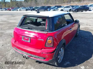 2009 MINI Hardtop S with VIN WMWMF73589TT95974, listed as a IAAI auction lot 41617775 with Not provided miles and . Bid and sale history available at DreamBid. Image 4.