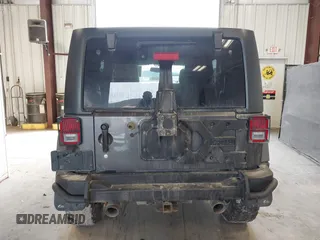 2017 Jeep Wrangler Unlimited Sahara with VIN 1C4BJWEG8HL638067, listed as a IAAI auction lot 41274352 with 57,339 mi miles. Bid and sale history available at carsss.com. Image 16.