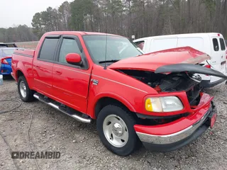 2003 Ford F-150 XLT with VIN 1FTRW07LX3KA76162, listed as a IAAI auction lot 41783926 with 119,009 mi miles. Bid and sale history available at carsss.com. Image 1.