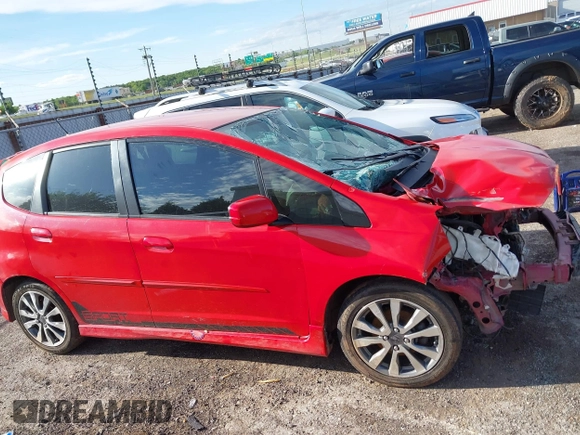 2013 Honda Fit Sport z VIN JHMGE8H51DC080183, wystawiony jako IAAI lot #42178982 z przebiegiem 174 133 mil mil oraz . Historia ofert i sprzedaży dostępna na DreamBid. Obrazek 13.