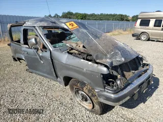 1989 Ford Bronco with VIN 1FMCU14T0KUA33910, listed as a Copart auction lot 57730195 with 53,335 mi miles and Salvage title. Bid and sale history available at DreamBid. Image 4.