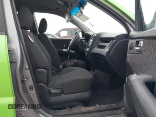 2008 Kia Sportage LX with VIN KNDJE723287471835, listed as a IAAI auction lot 41268401 with 200,404 mi miles and . Bid and sale history available at DreamBid. Image 5.