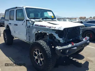 2021 Jeep Wrangler Unlimited Rubicon with VIN 1C4HJXFGXMW850556, listed as a IAAI auction lot 42234282 with 80,834 mi miles and . Bid and sale history available at DreamBid. Image 6.
