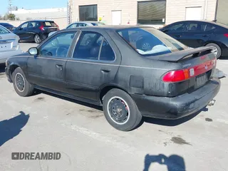 1998 Nissan Sentra XE z VIN 1N4AB41D8WC757796, wystawiony jako IAAI lot #41209171 z przebiegiem 160 108 mil mil oraz . Historia ofert i sprzedaży dostępna na DreamBid. Obrazek 3.