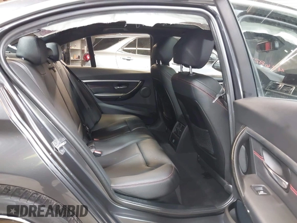 2018 BMW 3 Series 330i xDrive with VIN WBA8D9C51JEM34061, listed as a IAAI auction lot 42682318 with 65,245 mi miles and . Bid and sale history available at DreamBid. Image 8.