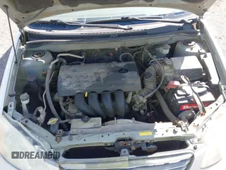 2003 Toyota Corolla CE with VIN 1NXBR32E23Z015648, listed as a IAAI auction lot 42056596 with 287,999 mi miles and . Bid and sale history available at DreamBid. Image 10.