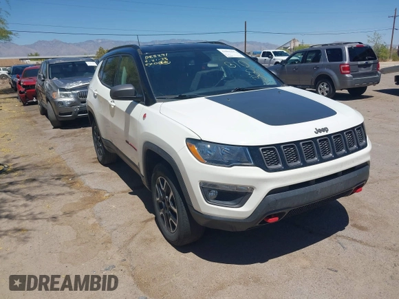 2019 Jeep Compass Trailhawk with VIN 3C4NJDDB4KT780239, listed as a IAAI auction lot 42095643 with 68,995 mi miles and . Bid and sale history available at DreamBid. Image 6.