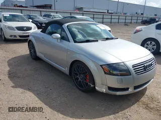2001 Audi TT z VIN TRUTC28N911001049, wystawiony jako IAAI lot #42438010 z przebiegiem 72 359 mil mil oraz . Historia ofert i sprzedaży dostępna na DreamBid. Obrazek 1.