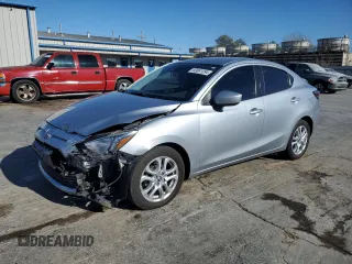 2018 Toyota Yaris with VIN 3MYDLBYV0JY305771, listed as a Copart auction lot 83691094 with 114,646 mi miles and Salvage Title. Bid and sale history available at DreamBid. Image 1.