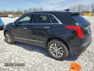 2017 Cadillac XT5 FWD with VIN 1GYKNARS2HZ131243, listed as a Copart auction lot 54189395 with 134,324 mi miles and Salvage Title. Bid and sale history available at DreamBid. Image 2.