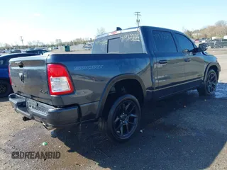 2020 Ram 1500 Big Horn with VIN 1C6SRFFT3LN331267, listed as a IAAI auction lot 41922224 with 143,297 mi miles. Bid and sale history available at carsss.com. Image 4.