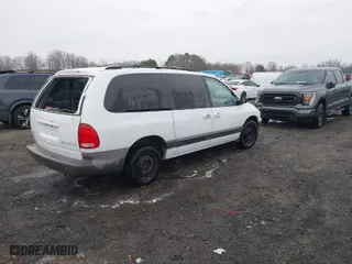 2000 Dodge Caravan SE with VIN 2B4GP44G7YR518808, listed as a IAAI auction lot 41602886 with 158,874 mi miles. Bid and sale history available at carsss.com. Image 4.