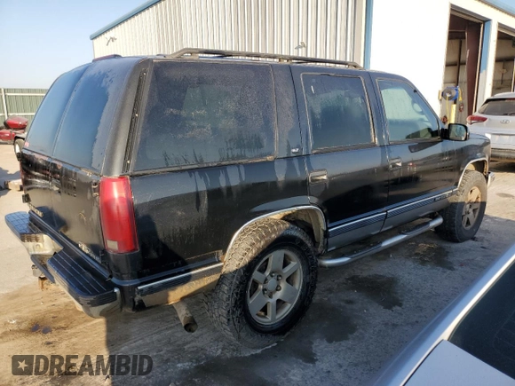 1997 GMC Yukon with VIN 1GKEK13R4VJ752757, listed as a Copart auction lot 75574214 with 251,193 mi miles and Clean Title. Bid and sale history available at carsss.com. Image 3.