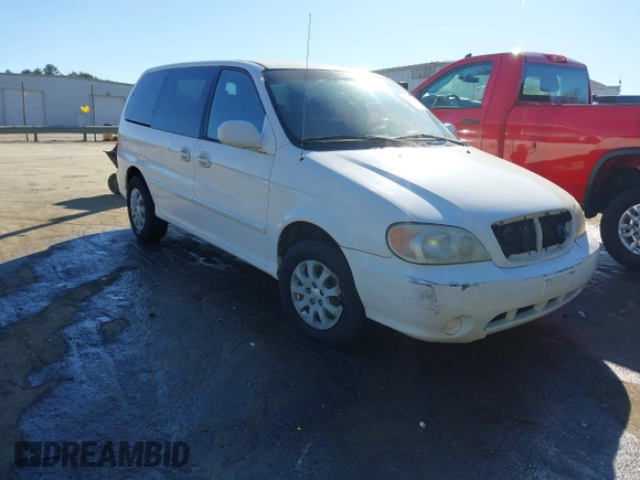 2005 Kia Sedona LX with VIN KNDUP132956703200, listed as a IAAI auction lot 41700159 with 125,578 mi miles. Bid and sale history available at carsss.com. Image 1.