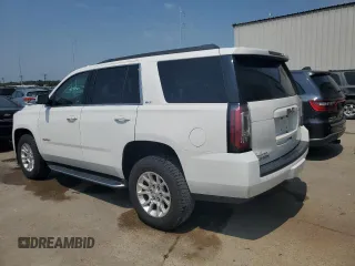 2020 GMC Yukon SLT with VIN 1GKS1BKC0LR243224, listed as a Copart auction lot 65768234 with 129,702 mi miles and Salvage Title. Bid and sale history available at DreamBid. Image 2.