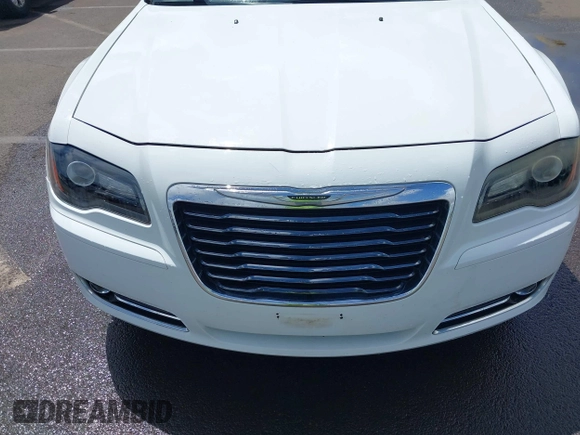 2012 Chrysler 300 S z VIN 2C3CCABG5CH115766, wystawiony jako IAAI lot #41893708 z przebiegiem 129 260 mil mil oraz . Historia ofert i sprzedaży dostępna na DreamBid. Obrazek 6.