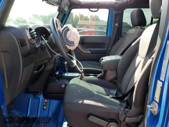 2015 Jeep Wrangler Unlimited Sport with VIN 1C4BJWDG1FL683558, listed as a Copart auction lot 59883545 with 107,267 mi miles and Salvage title. Bid and sale history available at DreamBid. Image 7.